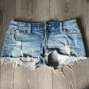 Distressed denim jean shorts